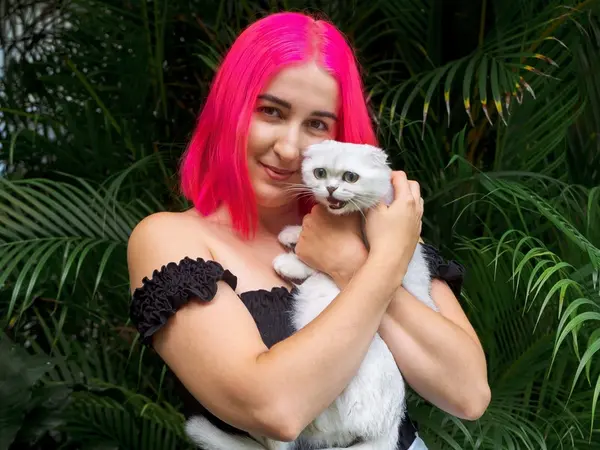 Our founder Mary with her favorite Scottish Fold cat Daenerys